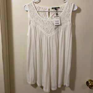 White sleeveless top with lace detail